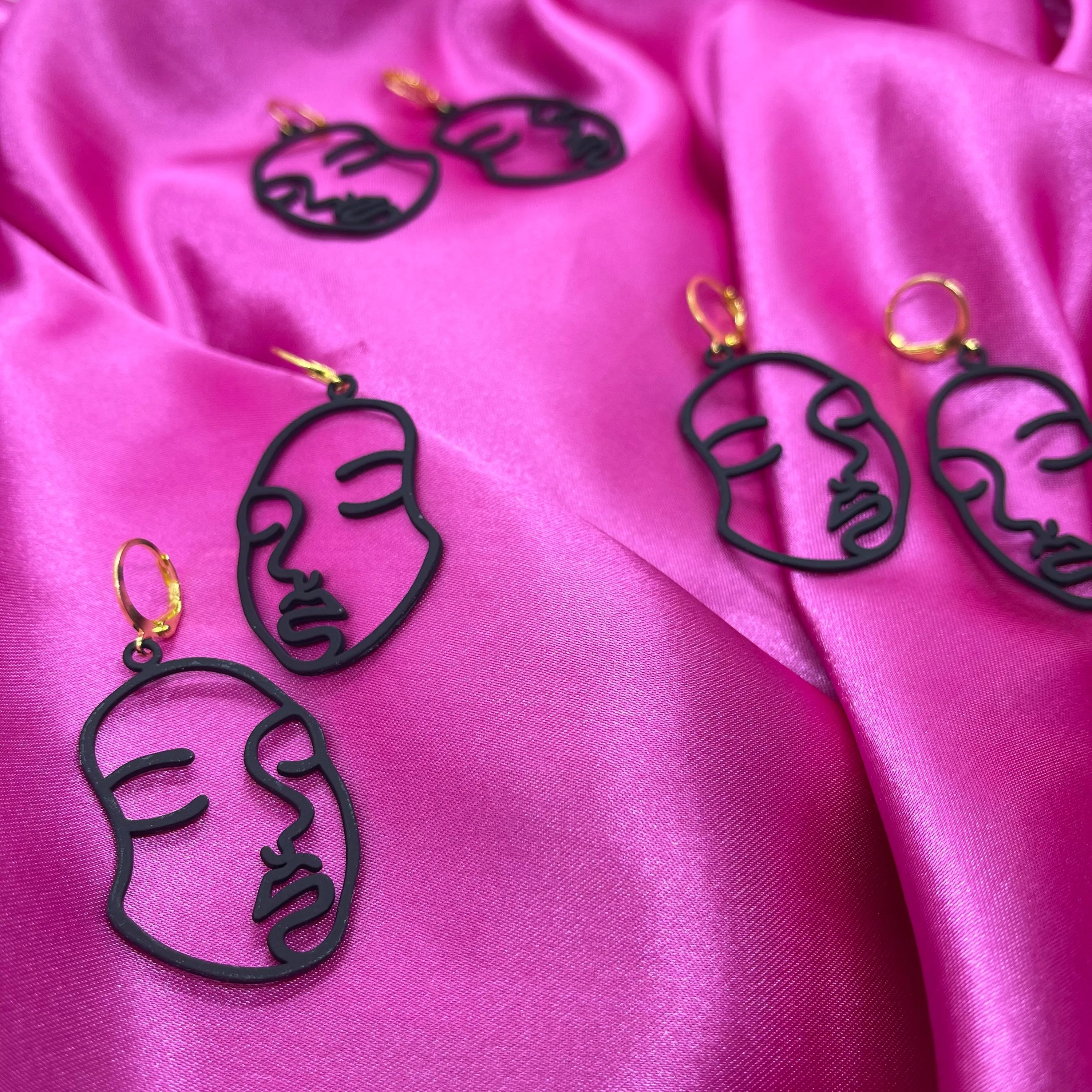 Black Abstract Face Huggie Hoop Earrings