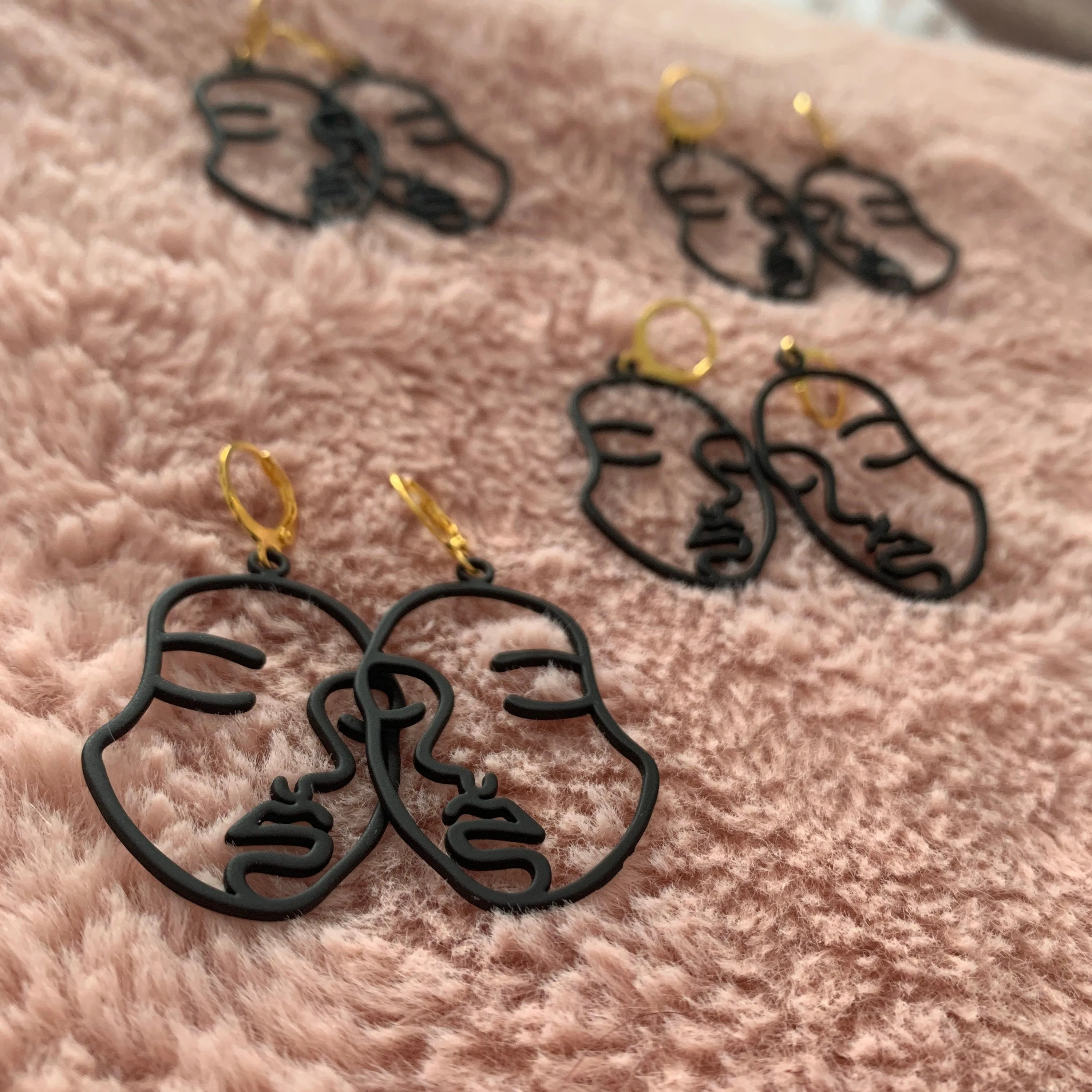 Black Abstract Face Huggie Hoop Earrings