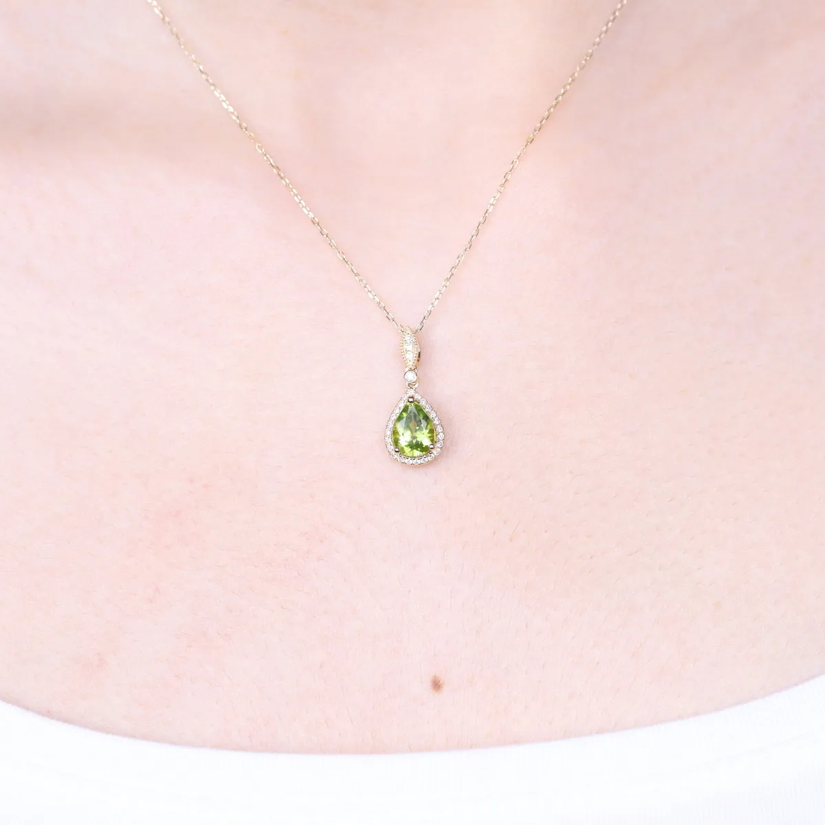 Violet 14K Yellow Gold Pear-Cut Manchurian Peridot Pendant